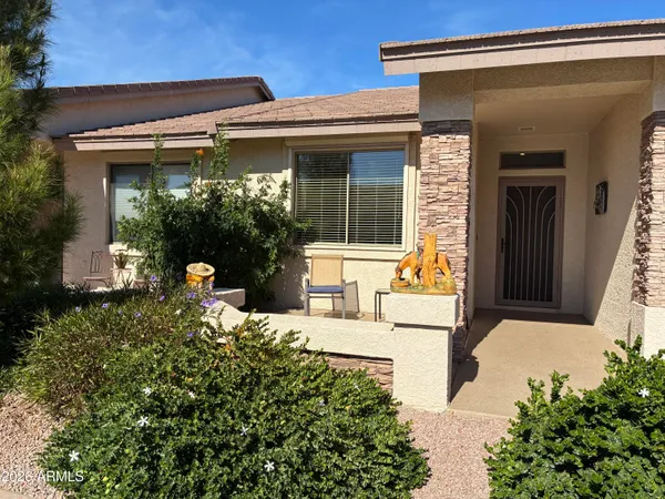front view of a house with a small yard