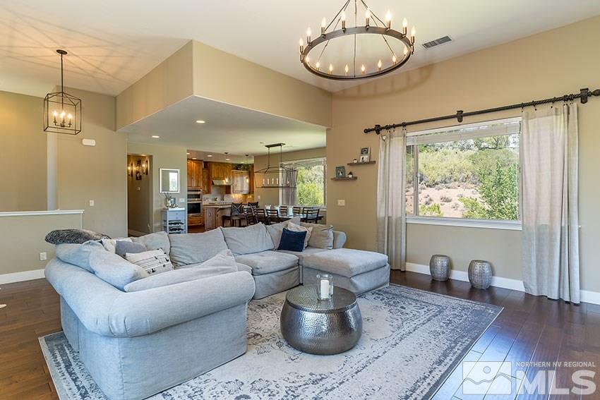 1195 Belford Road Reno, NV 89509 - Photo 10 of 35 a living room with furniture a window and a table