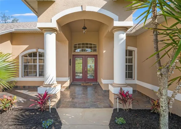 a front view of a house with an outdoor space
