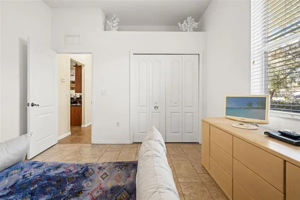 a living room with furniture and windows