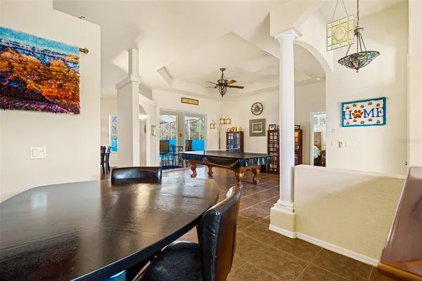 a view of a livingroom with furniture and windows