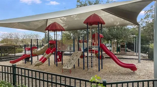 a view of a park with a slide