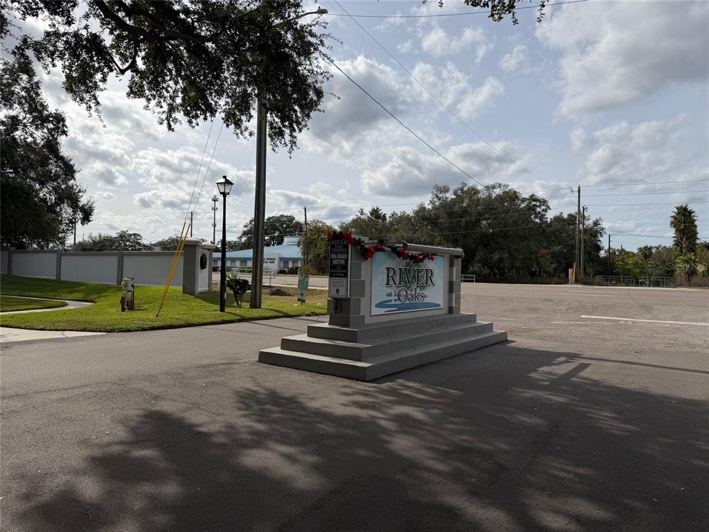 3818 River Oaks Court, Unit B New Port Richey, FL 34655 - Photo 5 of 7 a view of a park with large trees