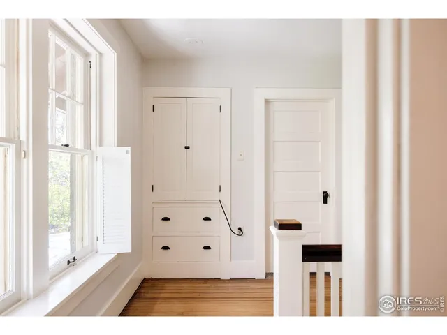 a view of bathroom with bathtub and windows