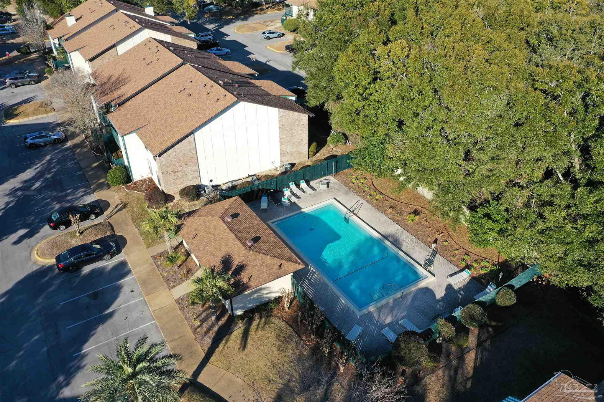 2299 Scenic Highway, Unit R10 Pensacola, FL 32503 - Photo 30 of 31 an aerial view of a house with a yard