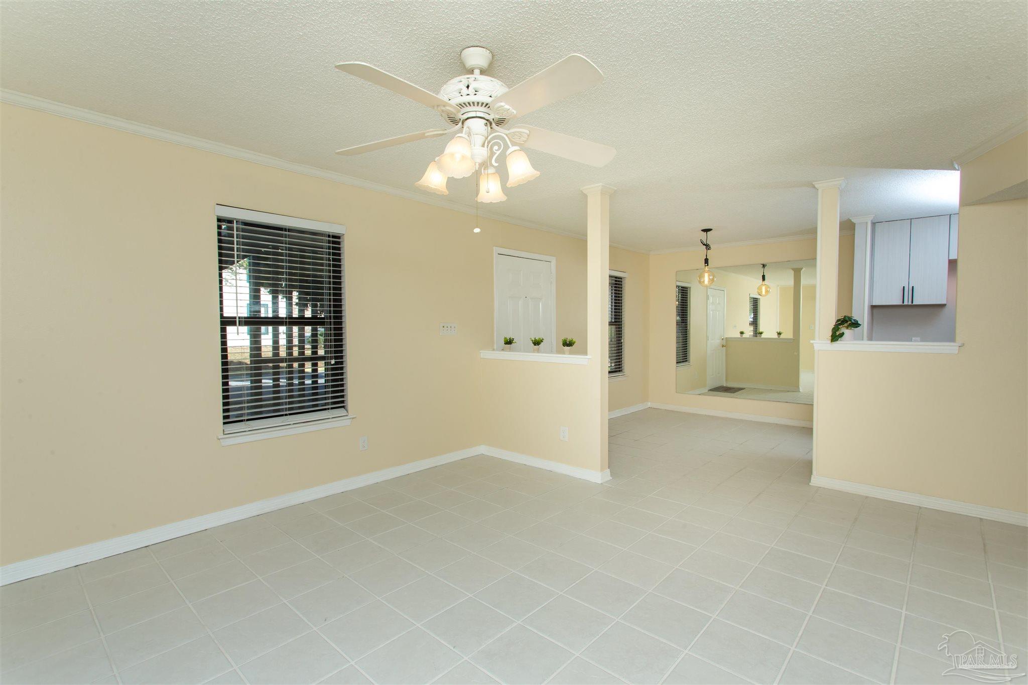 2299 Scenic Highway, Unit R10 Pensacola, FL 32503 - Photo 6 of 31 a view of an empty room with a window