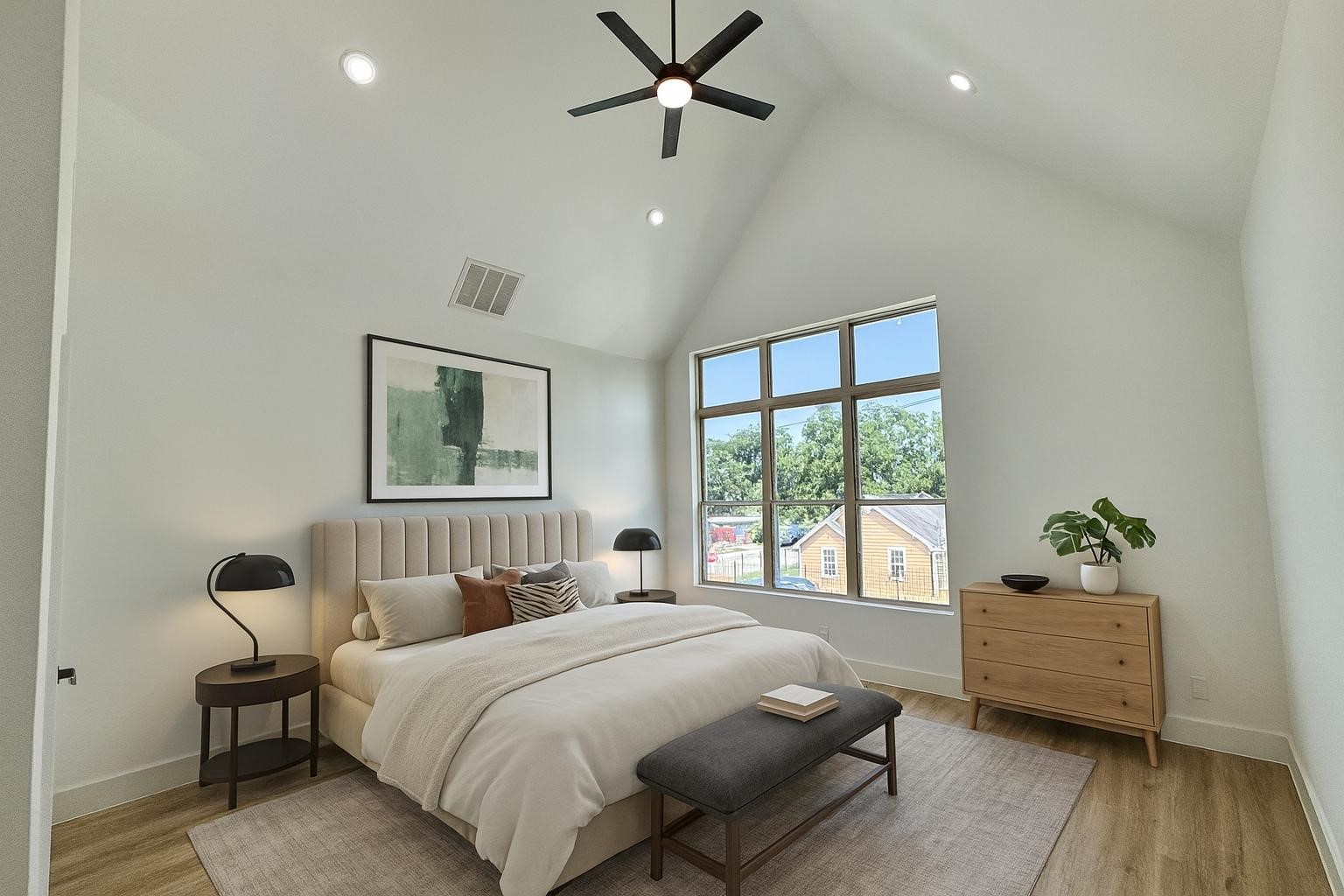 1506 Griffin Street Houston, TX 77009 - Photo 3 of 16 a bedroom with a bed and a window