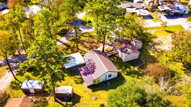 a view of a house with a yard porch and sitting area