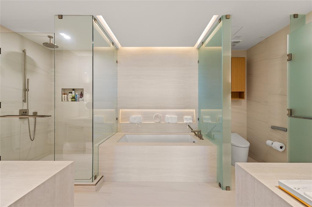 900 North Ocean Boulevard, Unit LPH05 Pompano Beach, FL 33062 - Photo 20 of 69 a bathroom with a bathtub and a shower