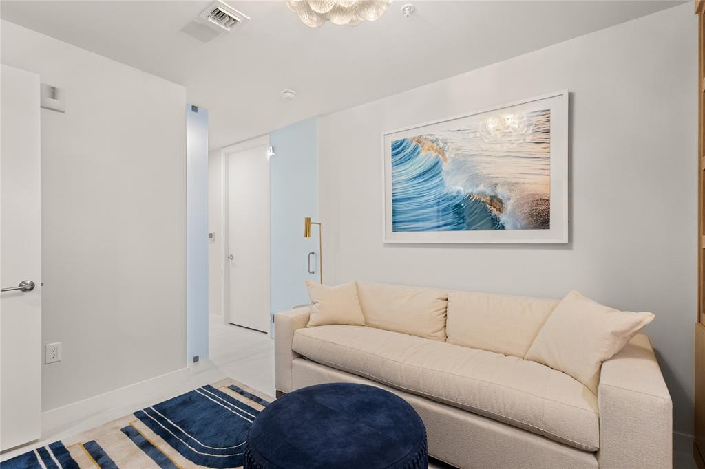 900 North Ocean Boulevard, Unit LPH05 Pompano Beach, FL 33062 - Photo 28 of 69 a living room with furniture and a window