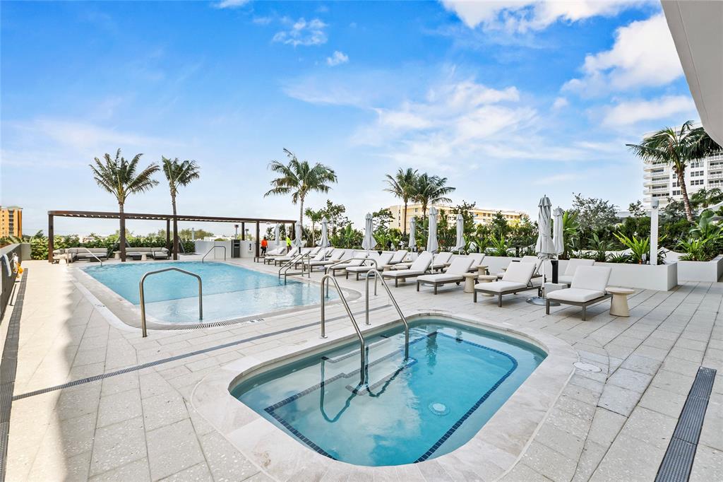900 North Ocean Boulevard, Unit LPH05 Pompano Beach, FL 33062 - Photo 56 of 69 a view of swimming pool with outdoor seating