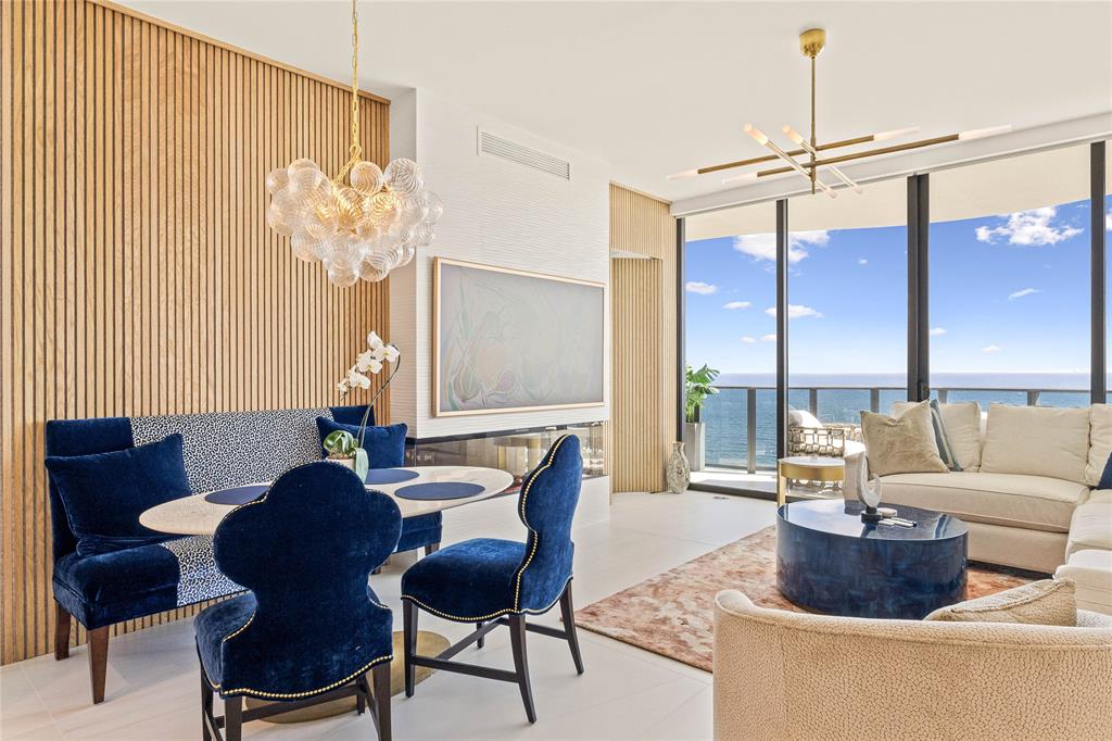 900 North Ocean Boulevard, Unit LPH05 Pompano Beach, FL 33062 - Photo 8 of 69 a living room with furniture and a large window