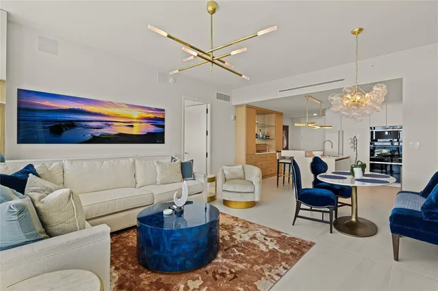 a kitchen with stainless steel appliances granite countertop a stove and a refrigerator