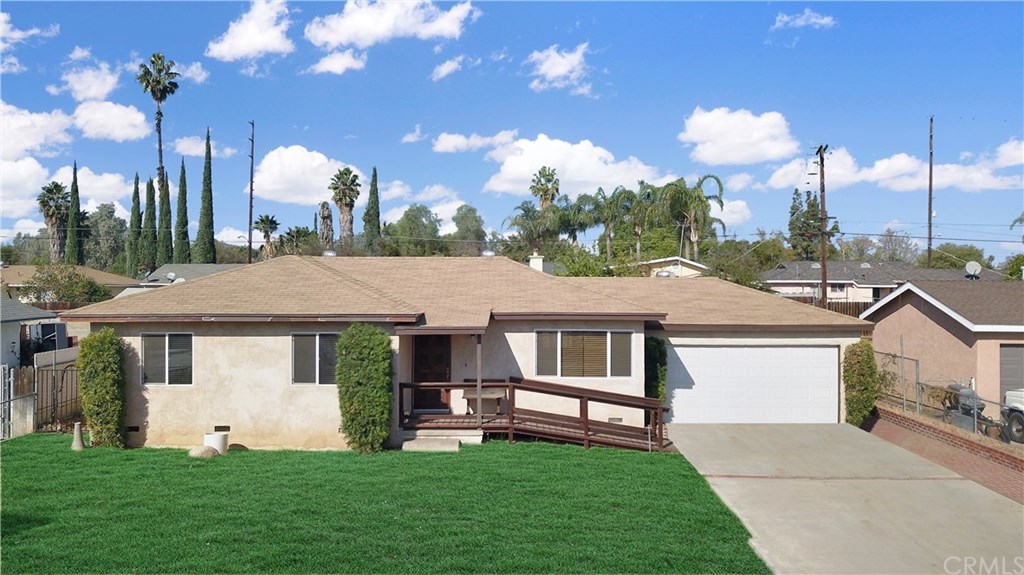 10565 Wolfe Avenue Riverside, CA 92505 - Photo 1 of 1 Grass has been digitally enhanced. There is currently no grass at the property. Grass is not included in the sales price.