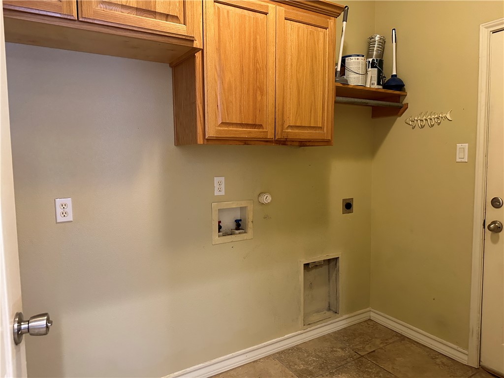 14010 Ambrosia Street, Unit A Corpus Christi, TX 78418 - Photo 7 of 13 a view of a garage