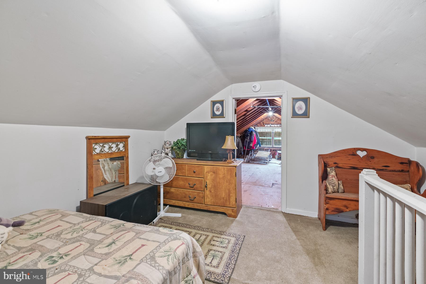 21610 Slidell Road Boyds, MD 20841 - Photo 17 of 25 a bedroom with a bed and a dresser