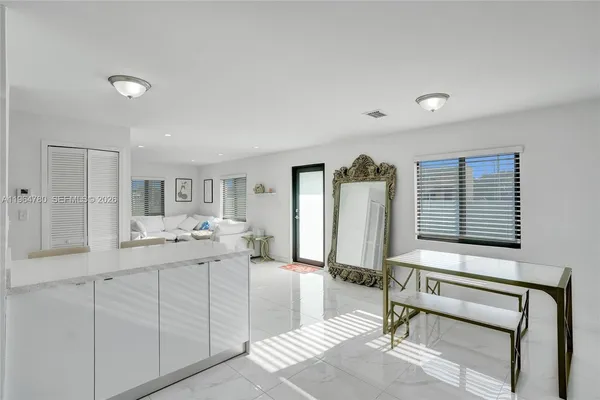 a living room with furniture and window