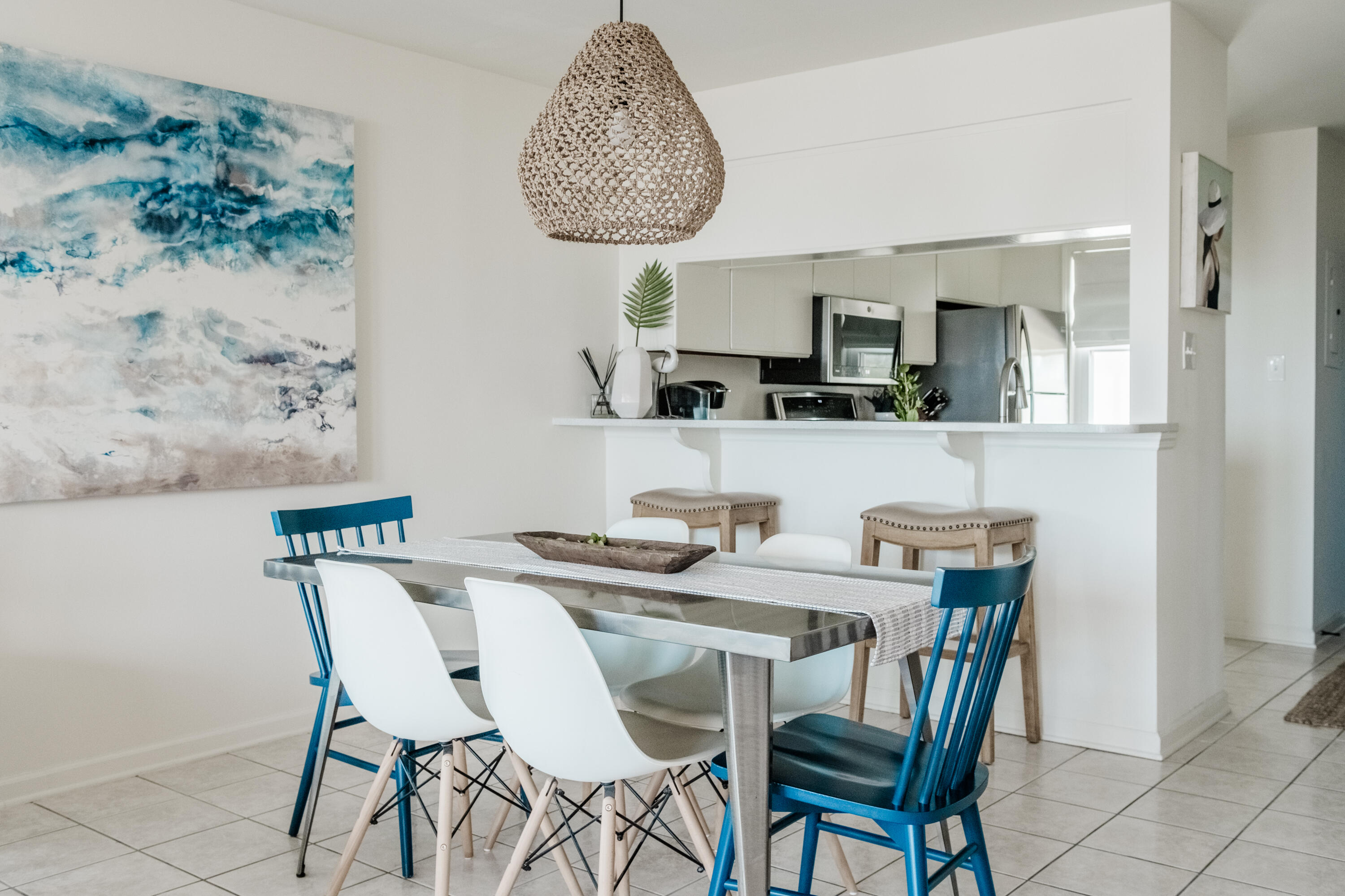 23011 Front Beach Road, Unit 58 Panama City Beach, FL 32413 - Photo 12 of 32 a view of a dining room with furniture