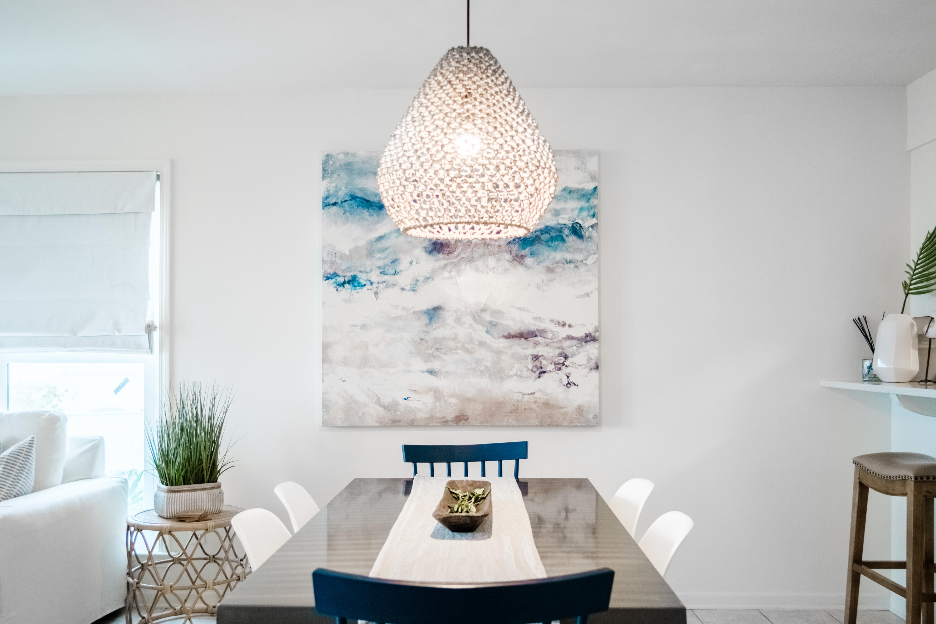 23011 Front Beach Road, Unit 58 Panama City Beach, FL 32413 - Photo 17 of 32 a view of a dining room with furniture and wooden floor