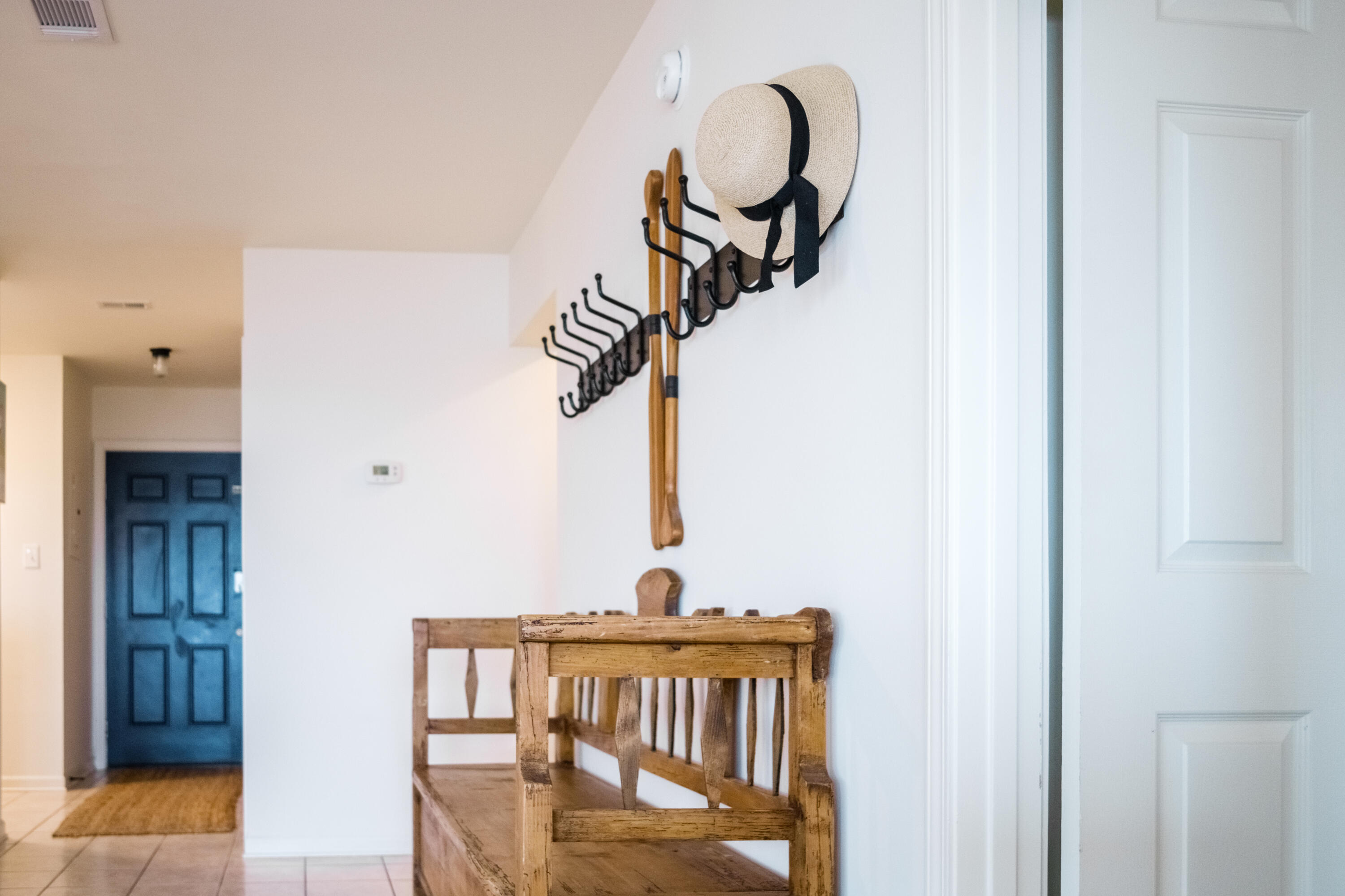 23011 Front Beach Road, Unit 58 Panama City Beach, FL 32413 - Photo 18 of 32 a view of a hallway with wooden floor