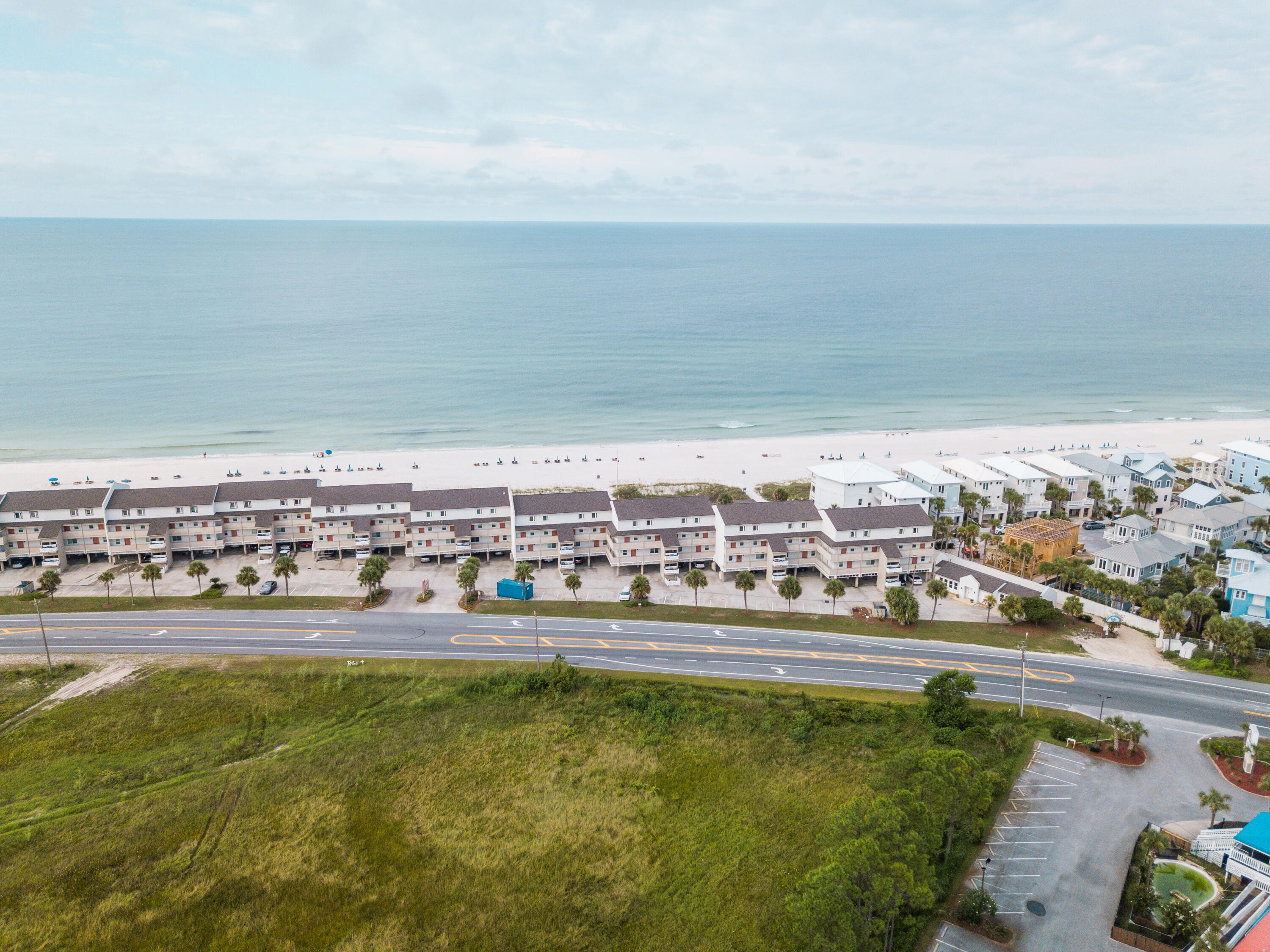23011 Front Beach Road, Unit 58 Panama City Beach, FL 32413 - Photo 7 of 32 a view of a swimming pool and an ocean view