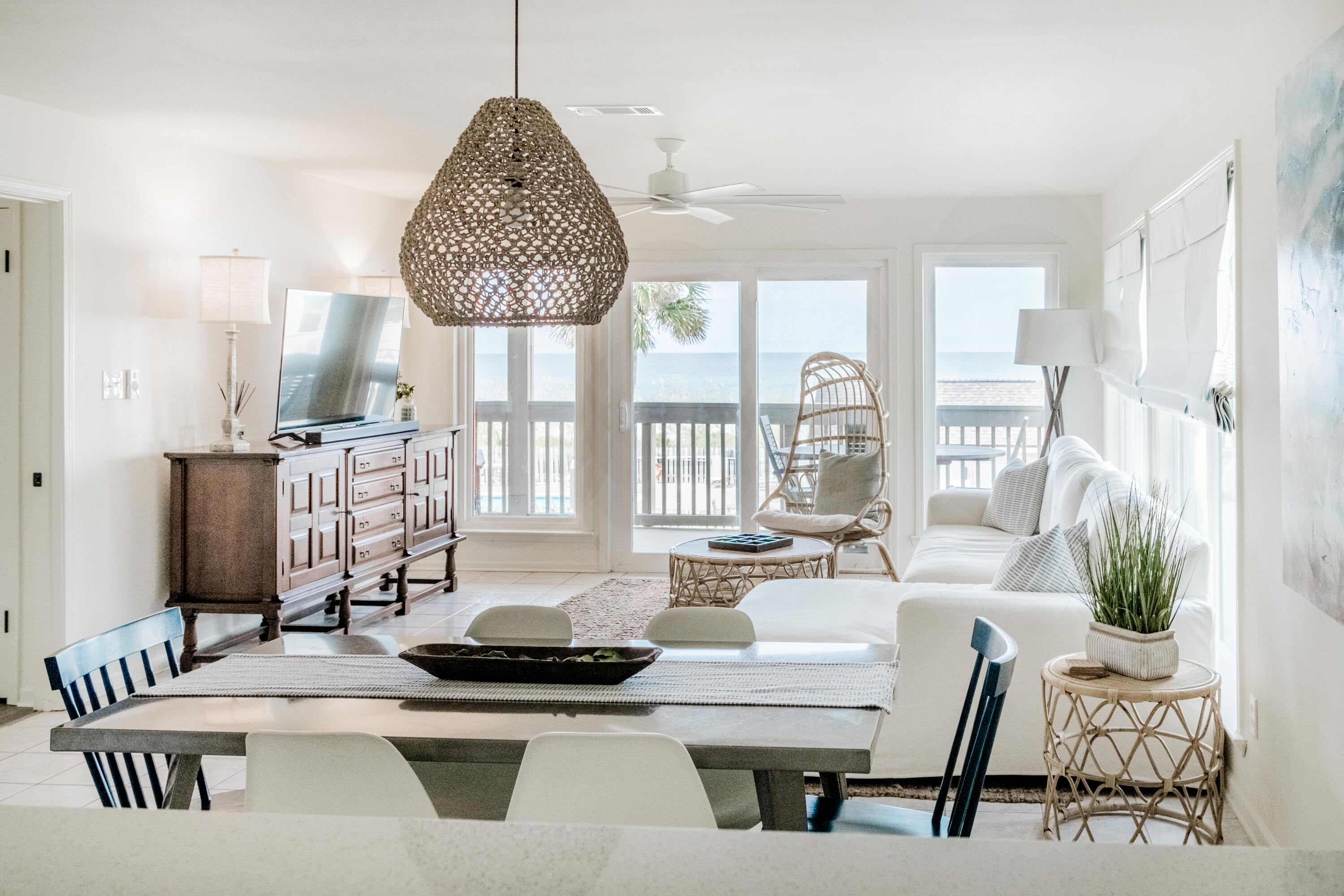 23011 Front Beach Road, Unit 58 Panama City Beach, FL 32413 - Photo 10 of 32 a living room with furniture and a large window