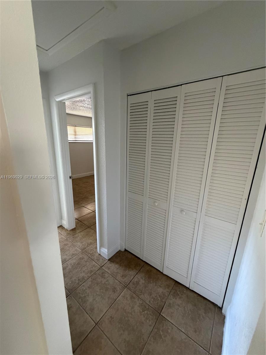 356 Southwest 2nd Place Pompano Beach, FL 33060 - Photo 12 of 23 a view of closet area