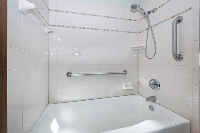 a kitchen with a refrigerator sink and stove