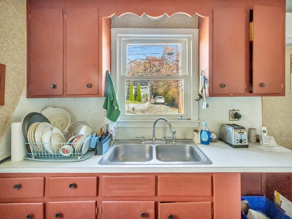 9 Madison Avenue Randolph, MA 02368 - Photo 16 of 30 a kitchen with a sink and cabinets