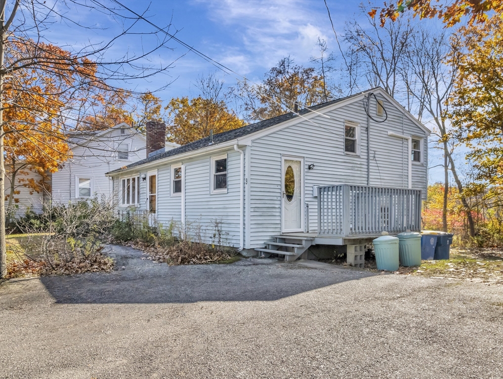 9 Madison Avenue Randolph, MA 02368 - Photo 2 of 30 a view of a house with a yard and large tree