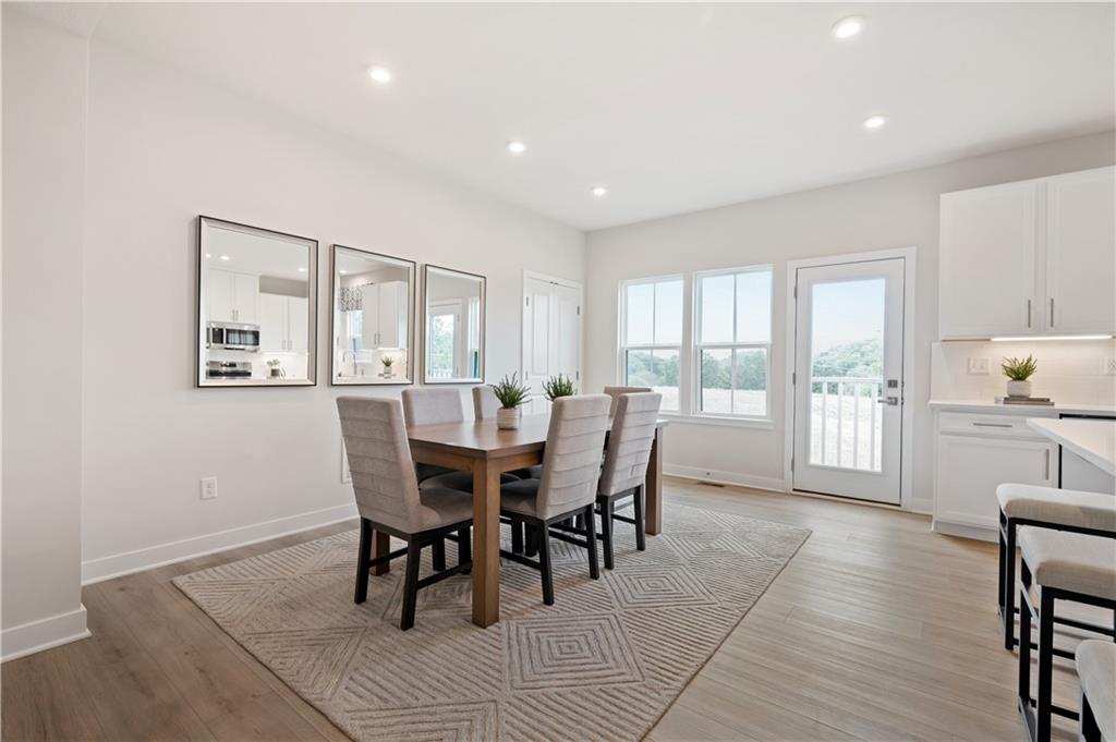 223 Elk Rdg Drive Moon Township, PA 15108 - Photo 4 of 17 a view of a dining room with furniture and wooden floor