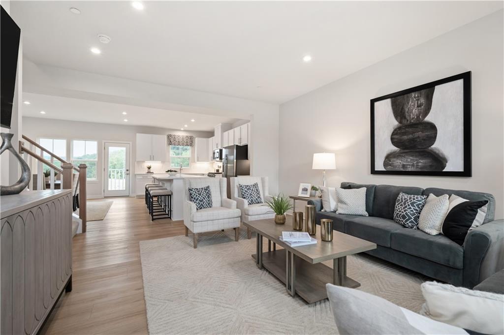 223 Elk Rdg Drive Moon Township, PA 15108 - Photo 6 of 17 a living room with furniture and a flat screen tv
