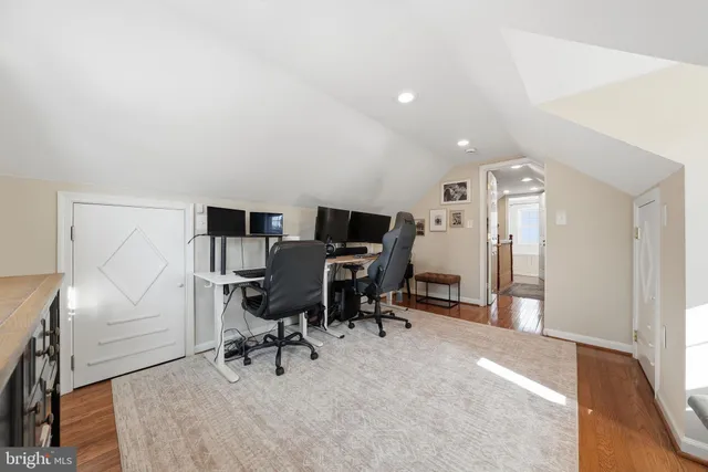 a view of a workspace with furniture