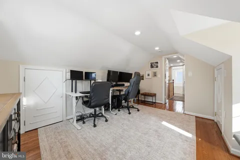 a view of a workspace with furniture