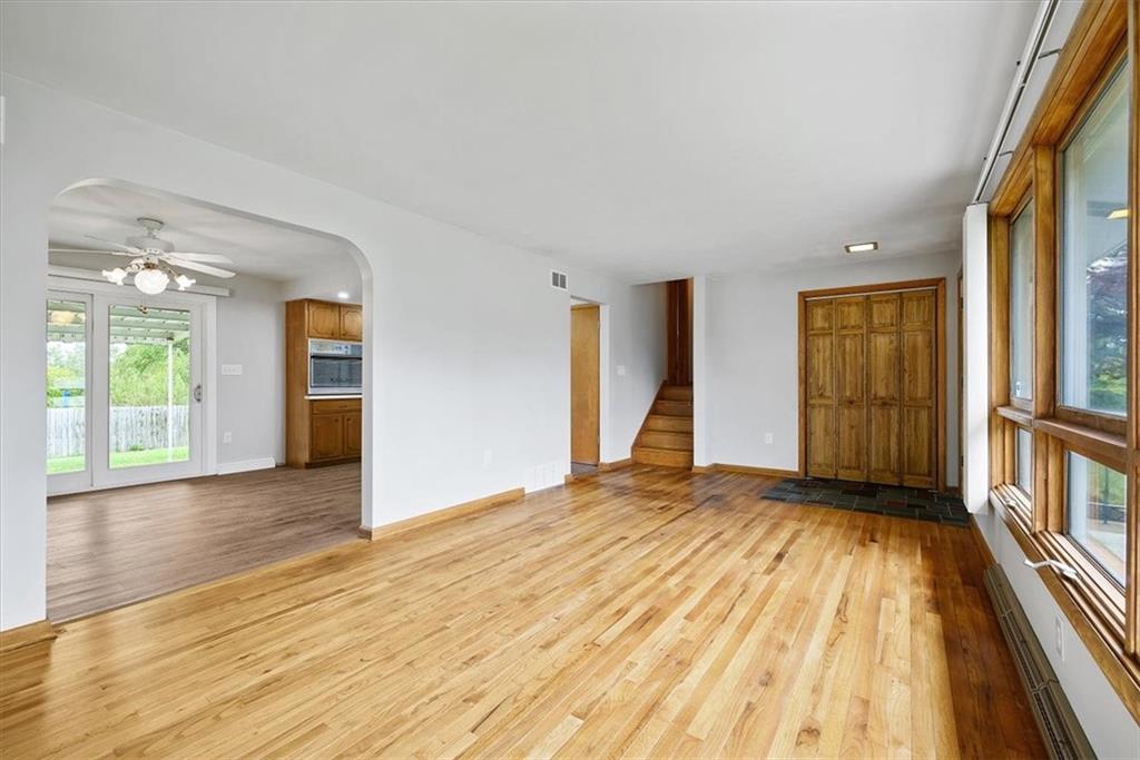 117 Randy Drive Butler, PA 16002 - Photo 4 of 24 a view of empty room with wooden floor and fan