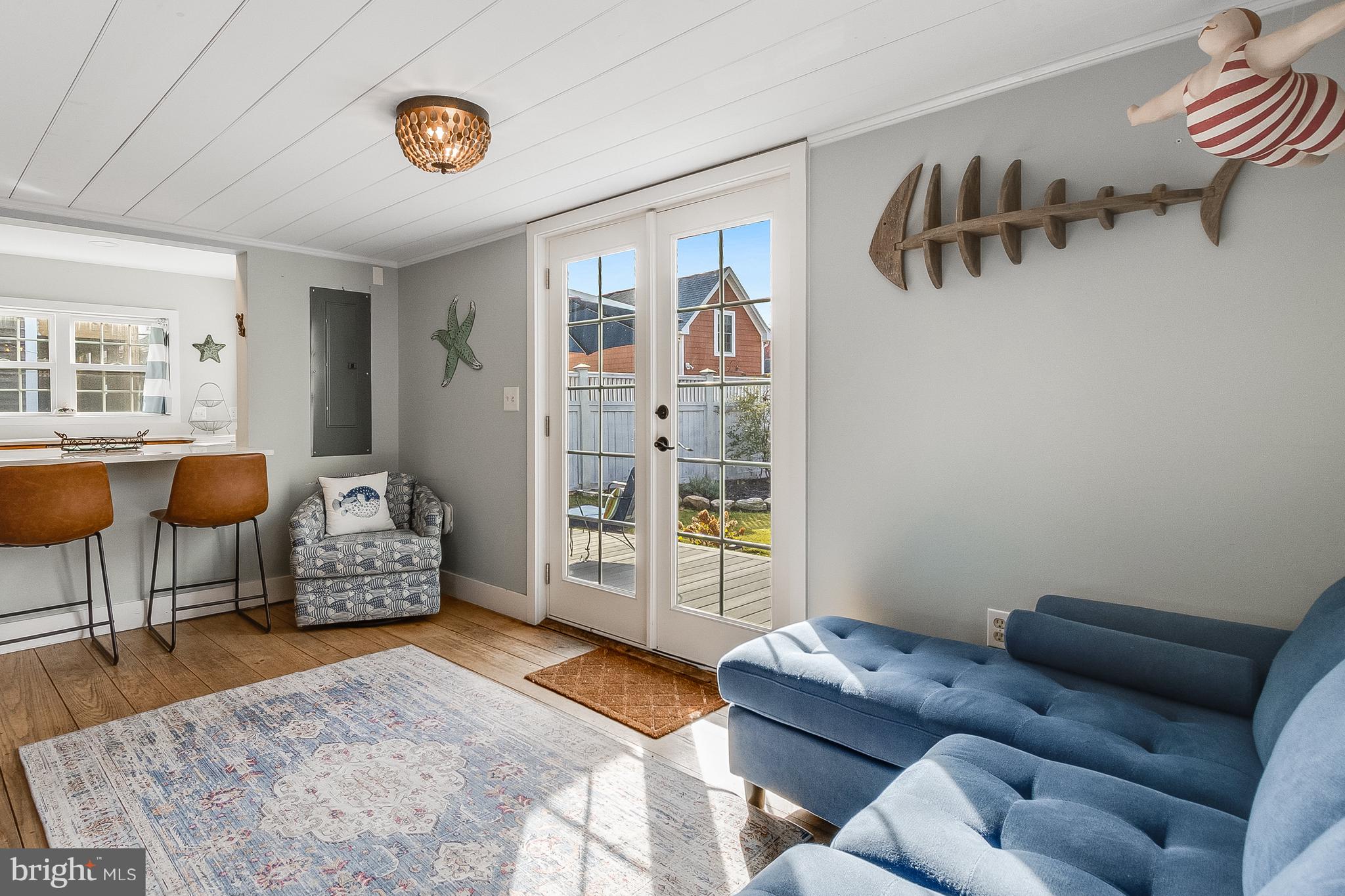 112 West 3rd Street Lewes, DE 19958 - Photo 19 of 73 a living room with furniture and wooden floor