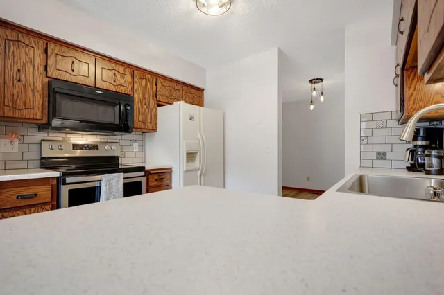 $244,900 | 1827 County Road E East, Unit 18, White Bear Lake, MN 55110