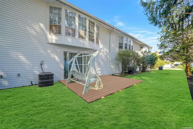 a view of backyard with green space