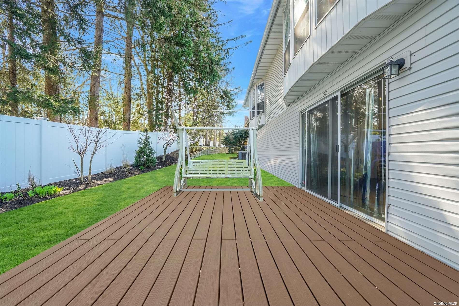 37 Santa Barbara Drive, Unit 37 Plainview, NY 11803 - Photo 23 of 32 a view of backyard with green space