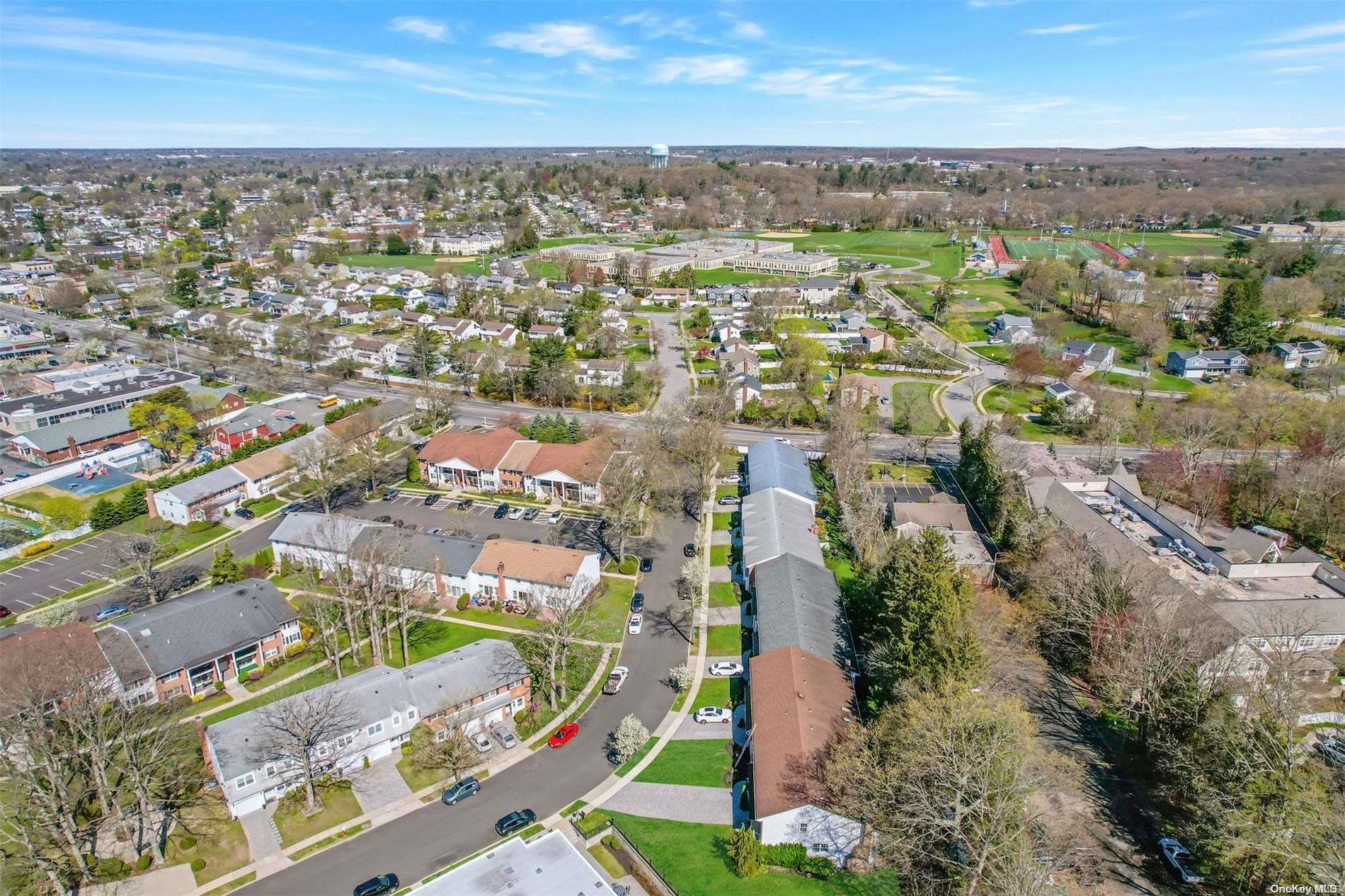 37 Santa Barbara Drive, Unit 37 Plainview, NY 11803 - Photo 3 of 32 an aerial view of residential building with green space