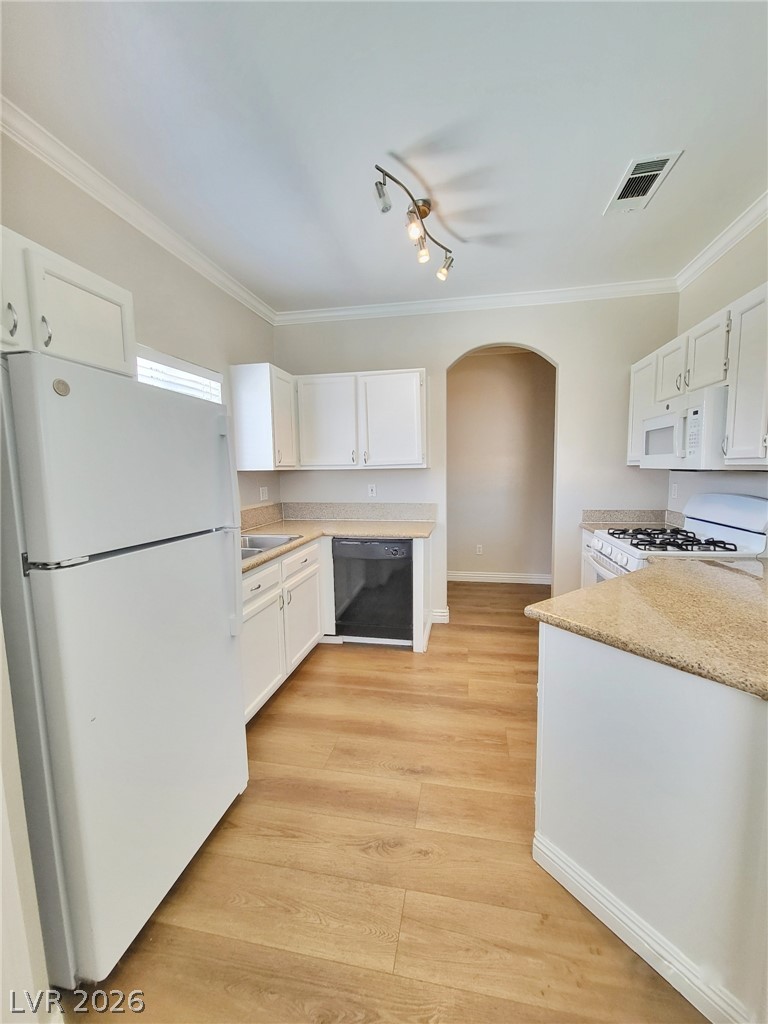 5525 West Flamingo Road, Unit 2040 Las Vegas, NV 89103 - Photo 5 of 15 A well-equipped kitchen awaits with abundant cabinet storage and granite-style countertops.