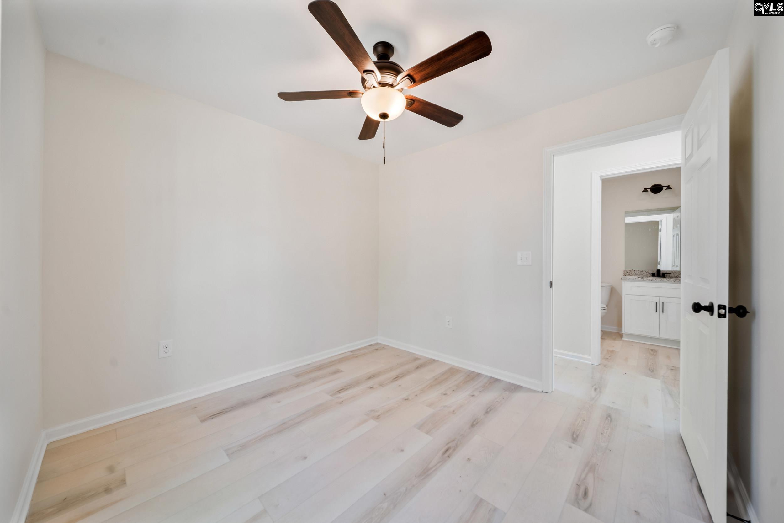 116 Sunny Acres Road Eastover, SC 29044 - Photo 16 of 40 wooden floor in an empty room