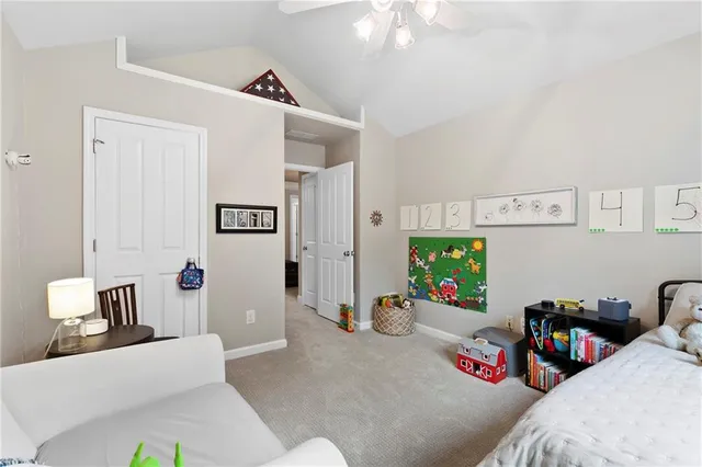 a bedroom with furniture and a couch