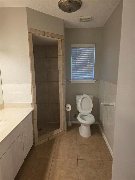 Undisclosed Address Hurst, TX 76054 - Photo 21 of 29 ENTRY TO 2ND BATH FROM HALL OR 3RD BEDROOM
