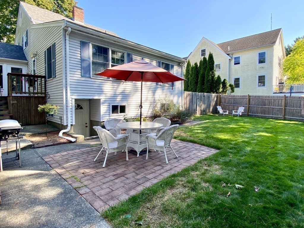 10 Duxbury Road Wellesley, MA 02481 - Photo 14 of 15 a view of a house with backyard porch and sitting area