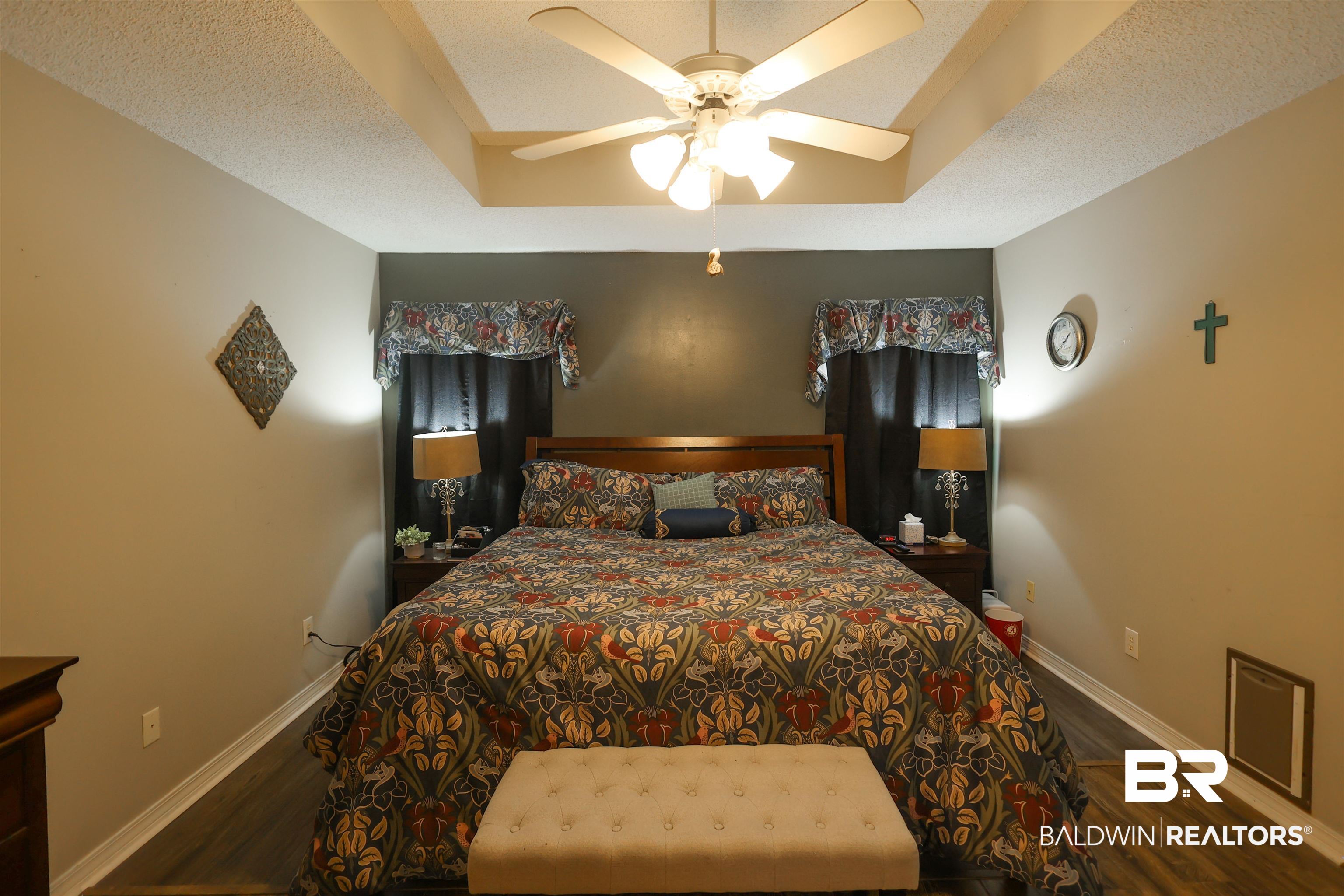7790 Audubon Drive Foley, AL 36535 - Photo 18 of 39 Tray ceiling with a ceiling fan
