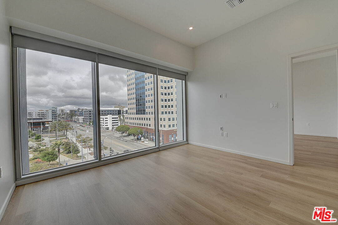 200 West Ocean Boulevard, Unit 711 Long Beach, CA 90802 - Photo 16 of 21 a view of a room with sliding glass door and mountain view