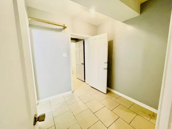a view of a room with an empty space