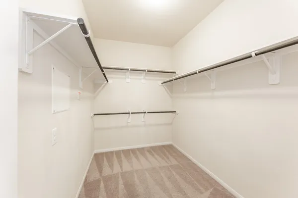 a view of an empty walk in closet