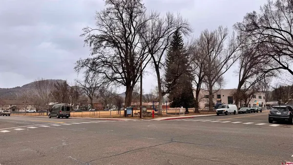 a view of road with houses